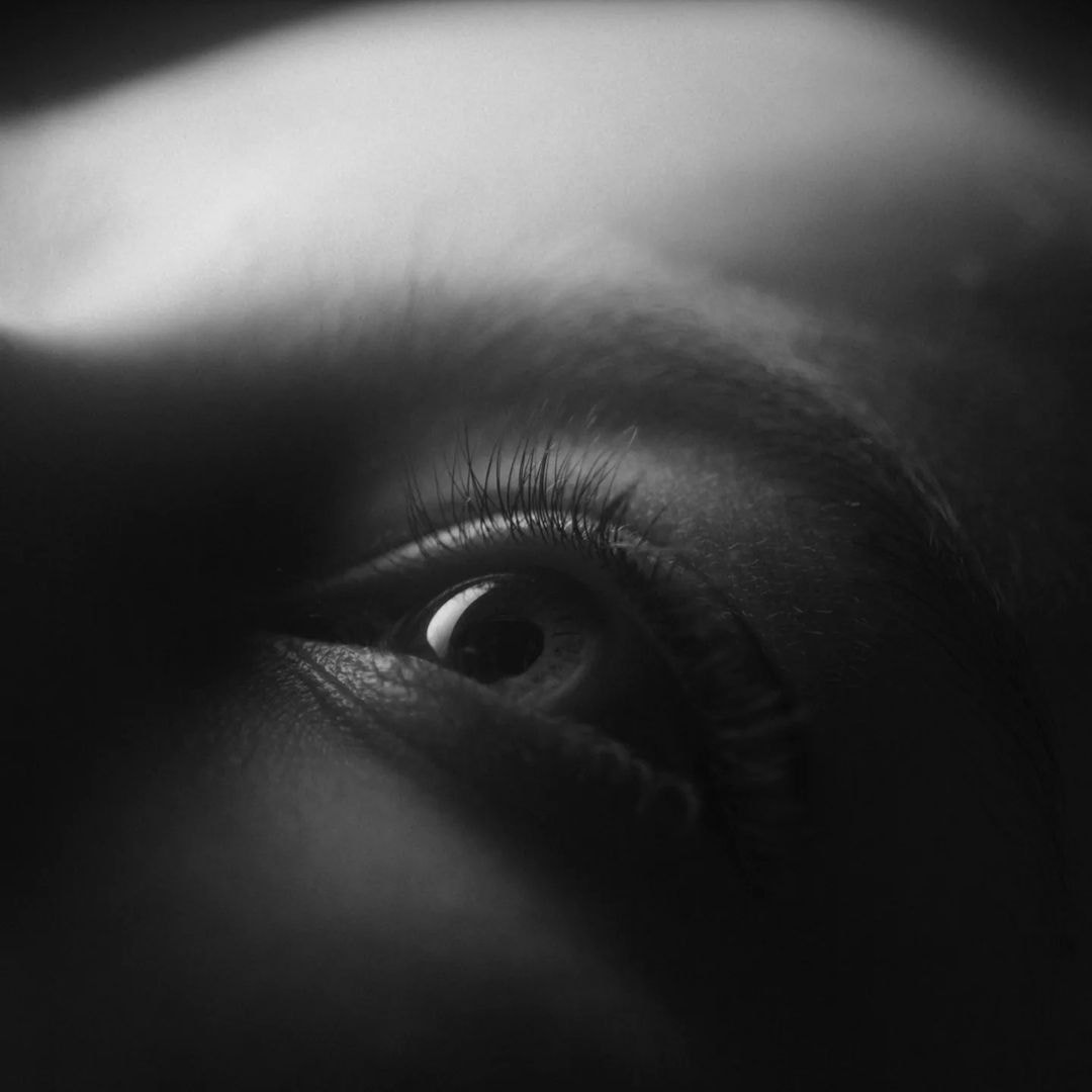 a close up of a person’s eye